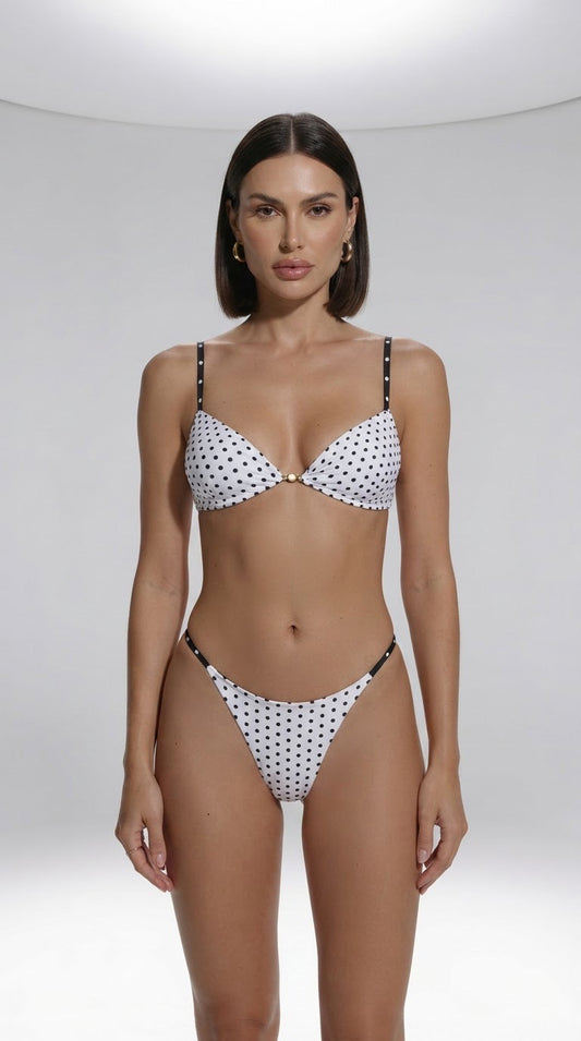A Waterbabes model wearing the Natalie Muse Polka dot Waterbabes bikini